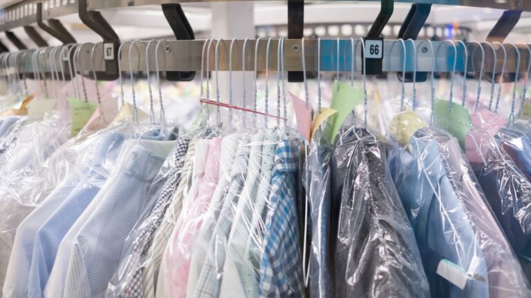rack full of dry clean only shirts