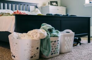 baskets of laundry in a bedroom
