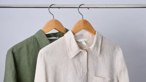 two linen shirts that have been washed and hung to dry