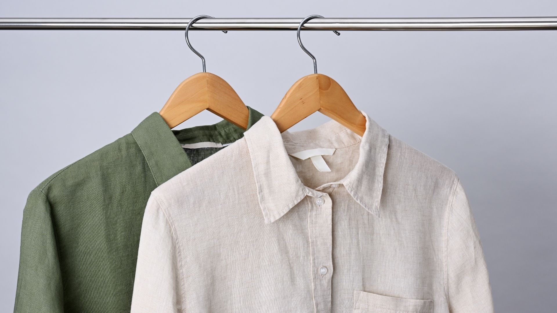 two linen shirts that have been washed and hung to dry
